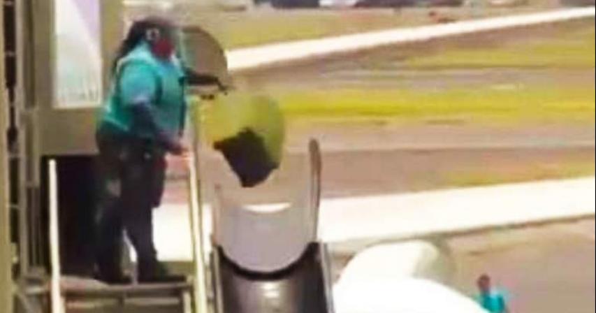 Baggage handler caught carelessly throwing luggage at airport