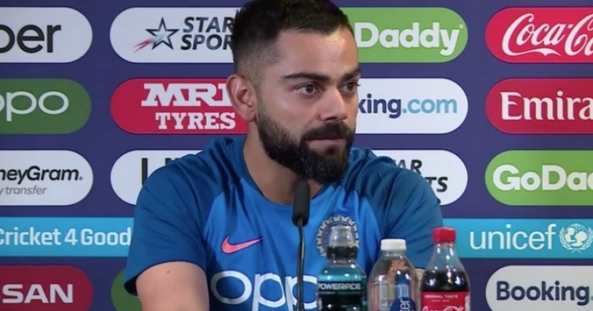 Virat Kohli reacts after India's first World Cup defeat